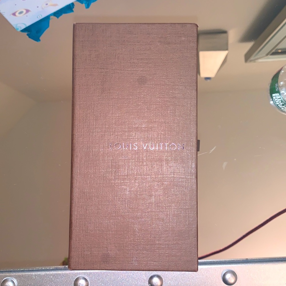 Louis Vuitton white with gold sunglasses